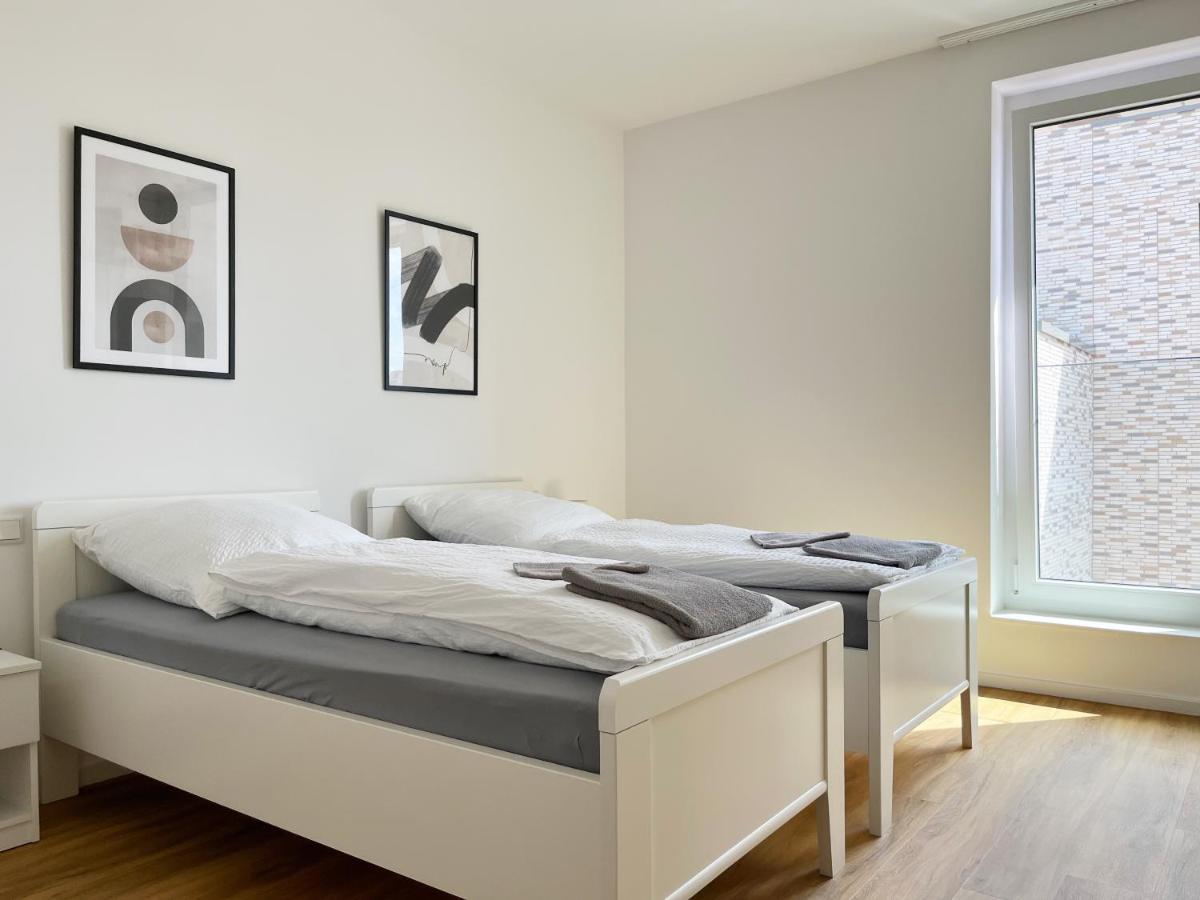 Moderne Apartments Im Herzen Der Stadt I Private Tiefgarage Mit Ladesaeulen I Home2Share อิบเบนบูเริน ภายนอก รูปภาพ