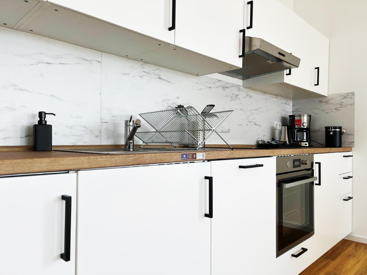 Moderne Apartments Im Herzen Der Stadt I Private Tiefgarage Mit Ladesaeulen I Home2Share อิบเบนบูเริน ภายนอก รูปภาพ