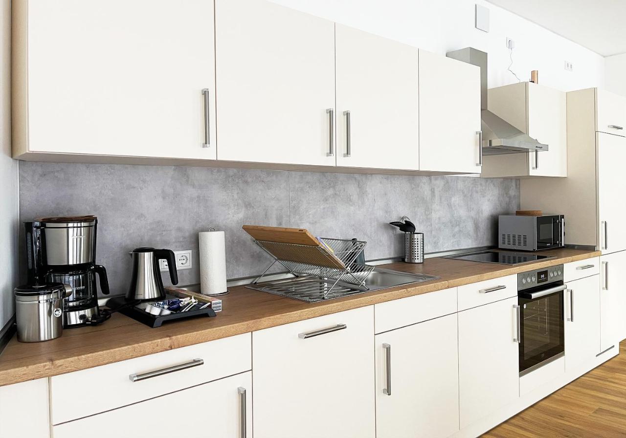 Moderne Apartments Im Herzen Der Stadt I Private Tiefgarage Mit Ladesaeulen I Home2Share อิบเบนบูเริน ภายนอก รูปภาพ