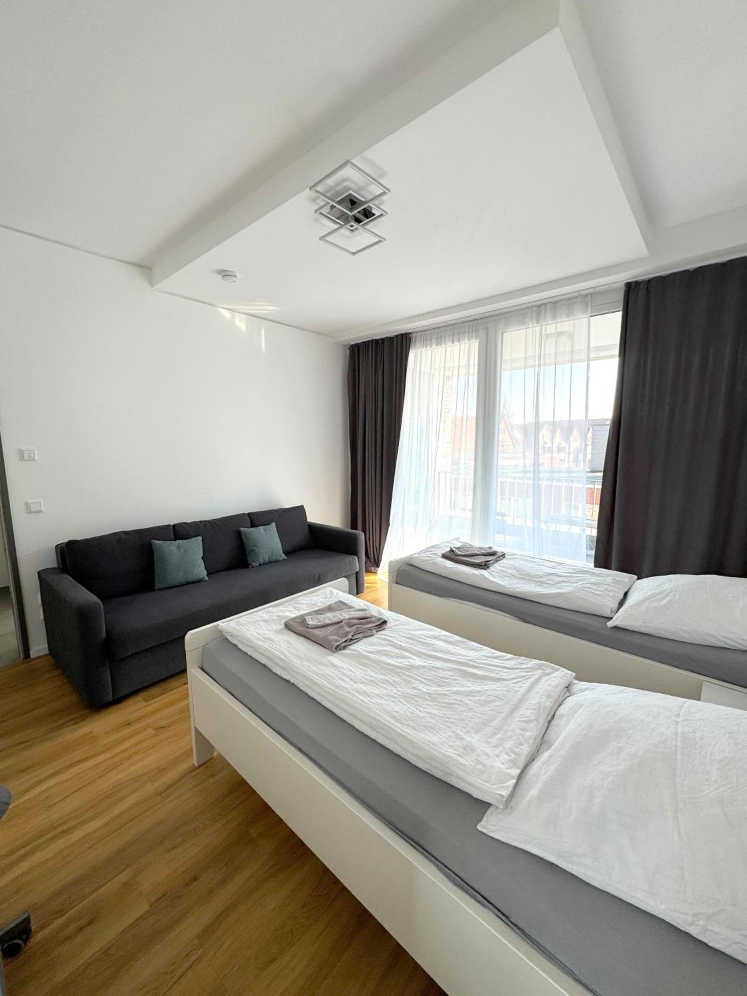 Moderne Apartments Im Herzen Der Stadt I Private Tiefgarage Mit Ladesaeulen I Home2Share อิบเบนบูเริน ภายนอก รูปภาพ